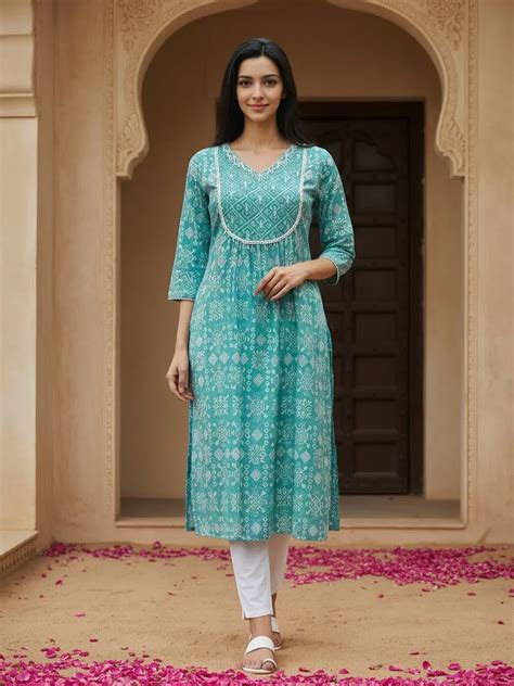 Cotton Embroidered Flared Calf Length Kurta –Rangita