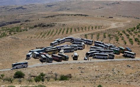Syrians Evacuate Lebanese Border Camps, Sent Back To Rebel-Held Syria ...