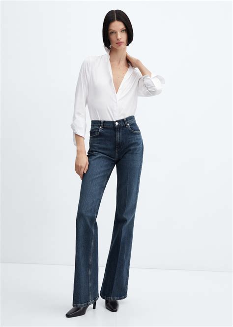 Medium-rise flared jeans - Women | MANGO OUTLET USA