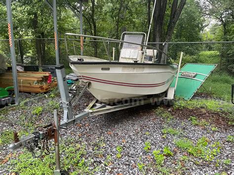 KEY LARGO 166 C/C BOAT W/MOTOR AND TRAILER | GovDeals