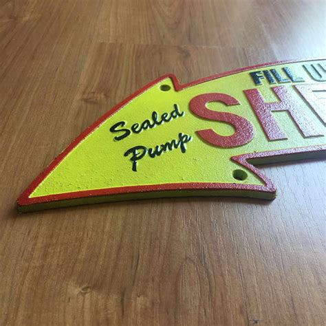 Image result for Shell Sign Arrow