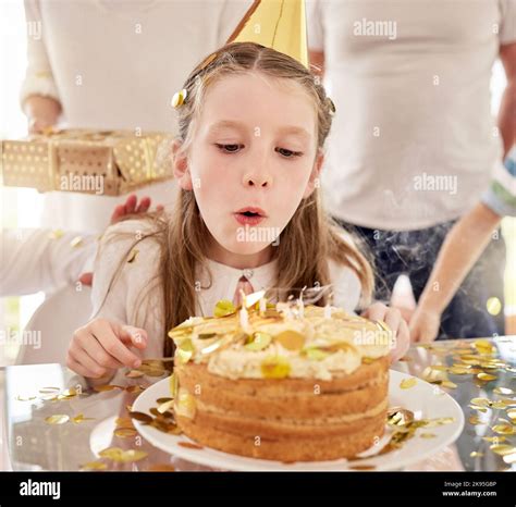 Birthday, kid and cake candles celebration of a girl from Germany at a ...
