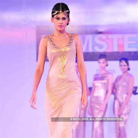 A model flaunts a designer creation during Hamstech fashion show ...