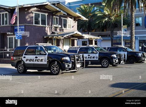 A Huntington beach police cruisers parked outside station Stock Photo ...