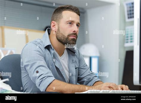 Royalty Free Image of Man Using Computer 的图像结果