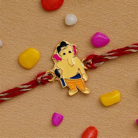 Ganesha Design Kids Rakhi and Roli Chawal Pack - eCraftIndia Online