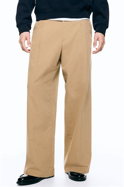 Loose Fit Tailored trousers - Beige - Men | H&M IN