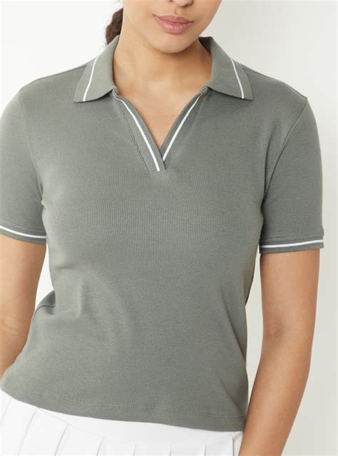 Buy Womrn Solid Johnny Collar Sports T-shirt Online at just Rs. 499.0 ...