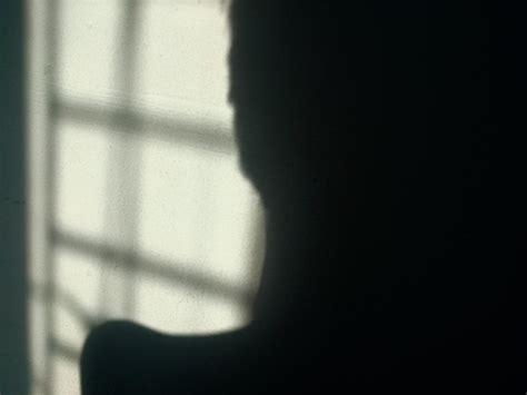 Shadow Person Using Computer 的图像结果