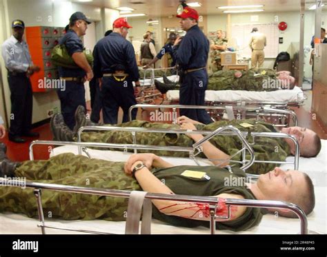 US Navy U.S. Navy doctors, nurses, and corpsmen practice emergency ...