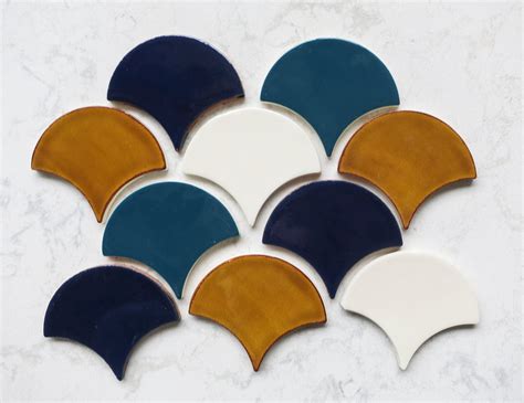 https://cdn.shopify.com/s/files/1/2440/8571/files/complementarytileglazesblueandorange_2048x2048.jpg?v=1519165718