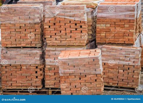 Stacked Red Clay Bricks on Pallets Stock Photo - Image of product, item ...