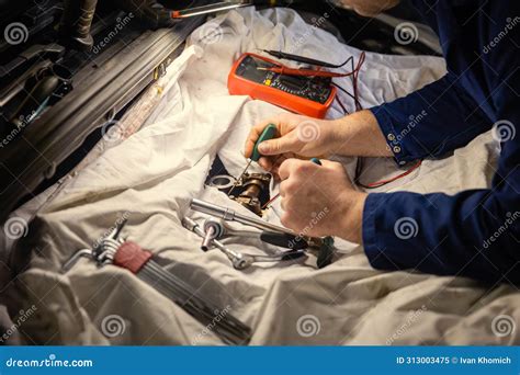 Male Mechanics at the Garage Fixing a Car Stock Image - Image of adults ...