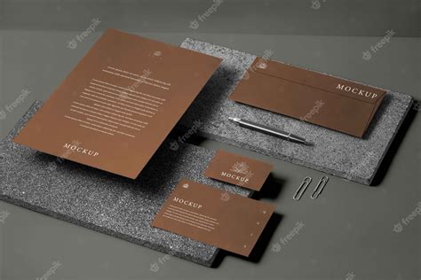 Elegant stationery mockup over stone board | Premium PSD
