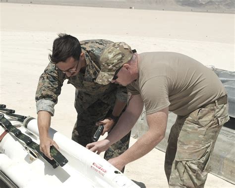 Joint service EOD techs join forces to destroy 12,000-pound missile ...