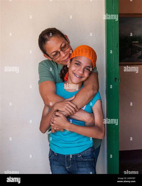 Gina and her daughter in her sister-in-law's hotel. They both are ...