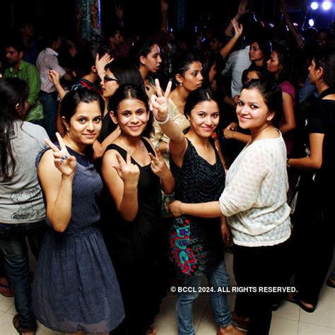 Students having a good time in a DJ party during Festember 2013, held ...