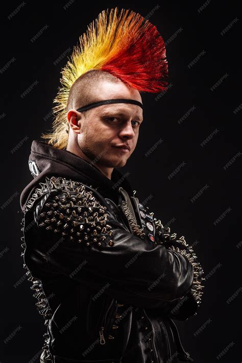 Premium Photo | Portrait of punk rocker with mohawk hairstyle on a ...