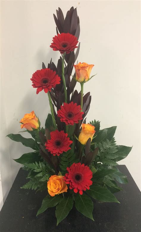 A simple line arrangement | Tropical flower arrangements, Flower ...