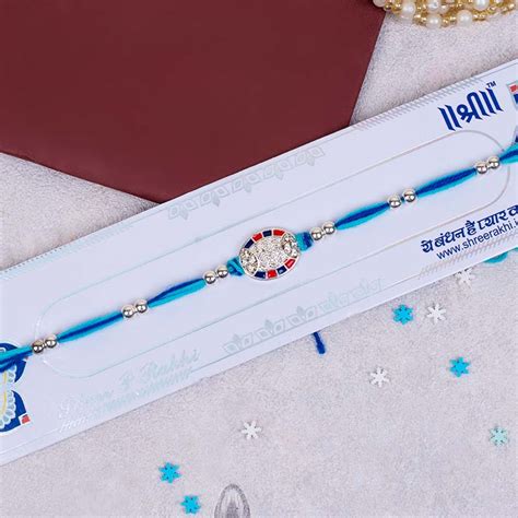 Send Fancy Silver Rakhi with Cadbury Celebrations Mini Pack Online ...