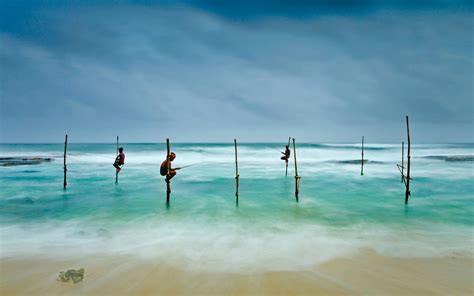 Download wallpaper sea, Sri Lanka, Koggala, fishermen on stilts ...