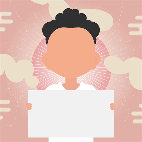 Un mignon petit garçon tient une feuille de papier vierge dans ses ...