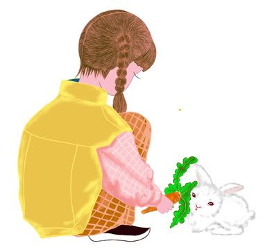 小女孩喂她的小兔子