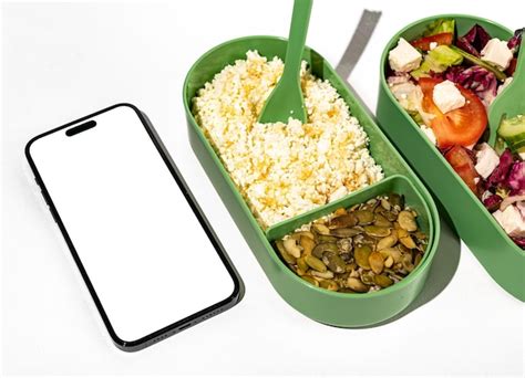 Lodz poland may 30 2023 mobile phone screen mockup and food containers ...