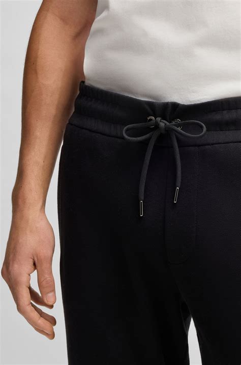 BOSS - Tracksuit bottoms in mercerised stretch cotton - Black