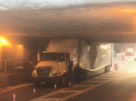 Semi stuck under bridge in Little Italy - cleveland.com