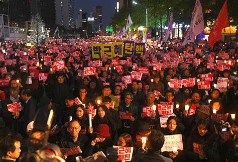 要求朴槿惠下台！韩国万人高举烛火示威|朴槿惠|韩国|示威_新浪财经_新浪网