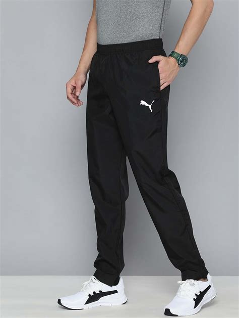 PUMA Men Black Brand Logo Printed Woven Track Pants