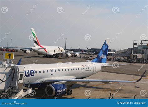 JetBlue Embraer 190 Aircraft at the Gate at the Terminal 5 and Emirates ...