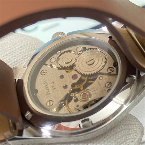 Vintage MOD HMT Gandaberunda Hand Winding 17 Jewels Orange Face Brown ...