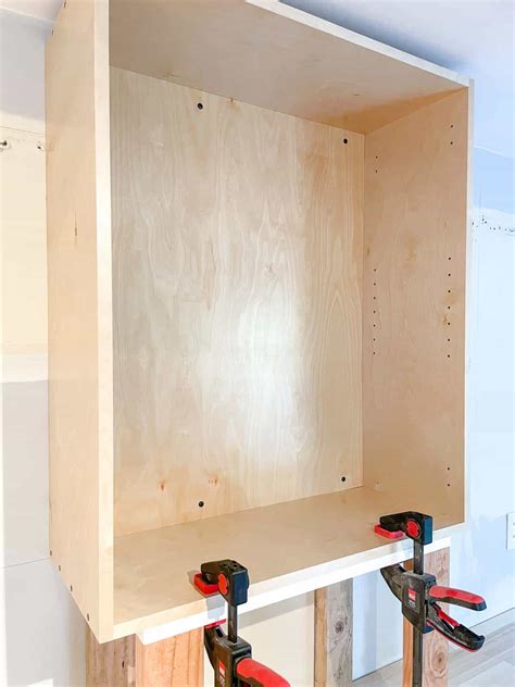 How To Hang Cabinets On A Concrete Wall at Mario Anderson blog