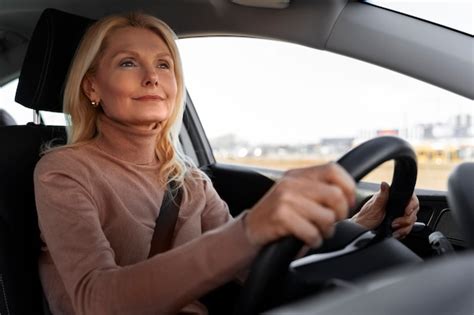 Woman driving car during license test | Free Photo