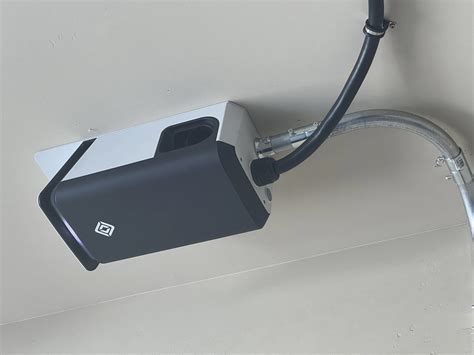 Ceiling mounted Rivian wall charger with drop down cord | Rivian Forum - R1T R1S R2 R3 News ...