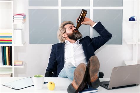 Premium Photo | Office worker drinking beer in office fun office worker ...
