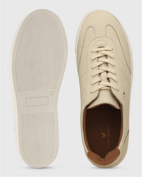 Buy Leather Ivory White Solid Sneakers Online