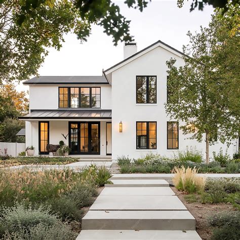 Modern Farmhouse Front Exterior White House with Black Windows ...