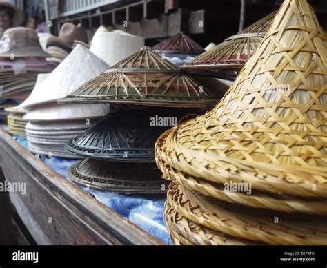 conical Asian hats Stock Photo - Alamy