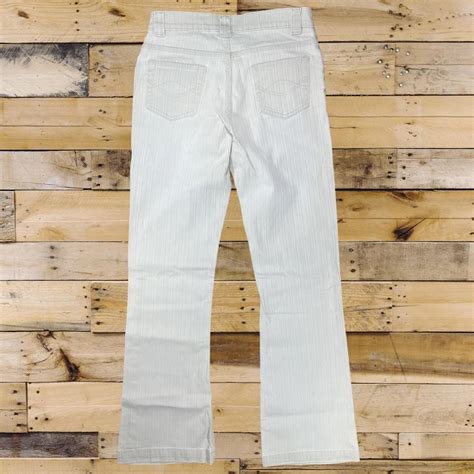 Y2K Low Waisted Faded Flared Jeans Cream Slim Fit... - Depop