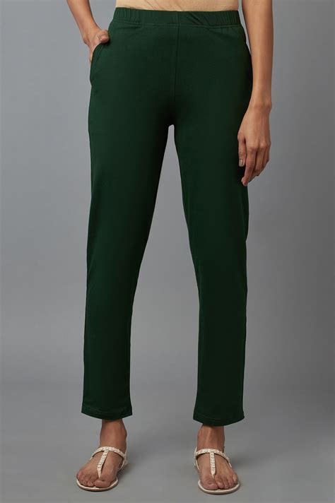 Buy Dark Green Solid Flared Cotton Pants With Elasticated Waist Online ...