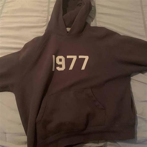 brown 1977 essentials hoodie - Depop