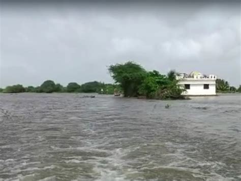 As the embankment of Ojat river broke, the village of Osa Ghed turned ...