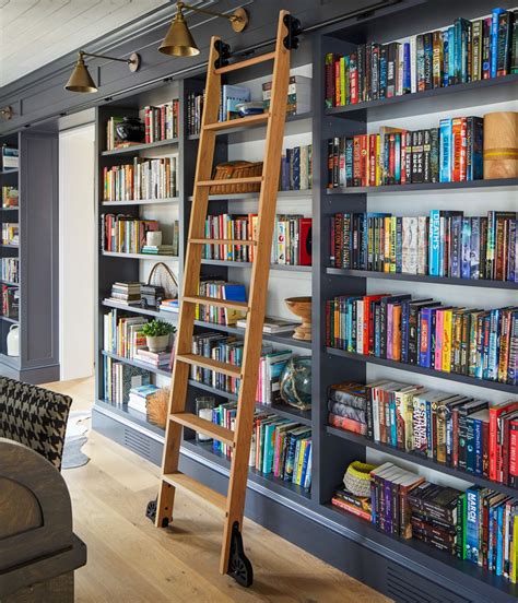 A Home Library is the Perfect Place for Curling Up with a Book | Home libraries, Home library ...