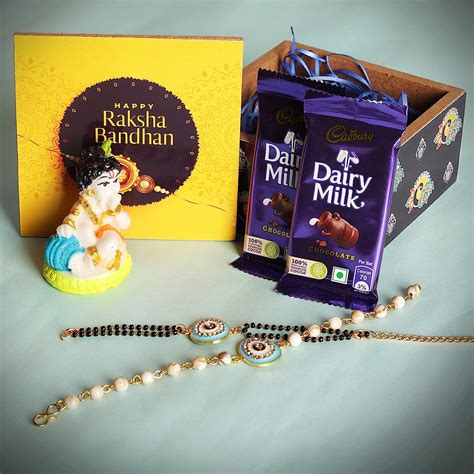 CLUZE Rakhi Hamper for Bhaiya Bhabhi Evil Eye Rakhi with Chocolate and ...