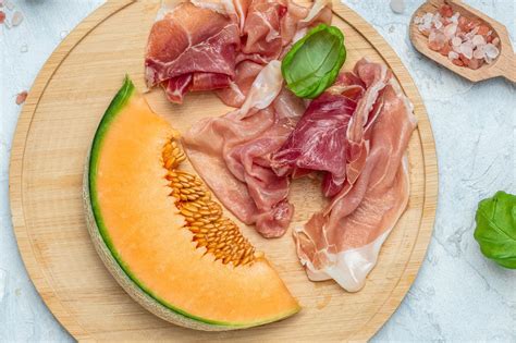 Premium Photo | Cantaloupe melon with ham prosciutto jamon traditional ...