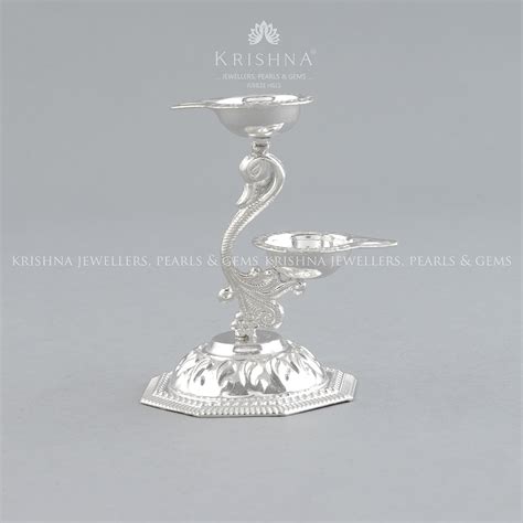 silver-peacock-deepam-stand – Krishna Jewellers Pearls and Gems Pvt Ltd