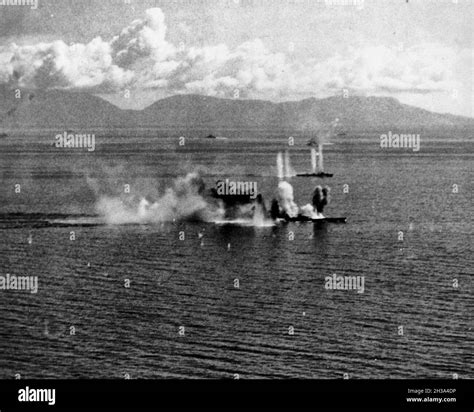 Japanese Battleship Musashi under attack by American carrier aircraft ...
